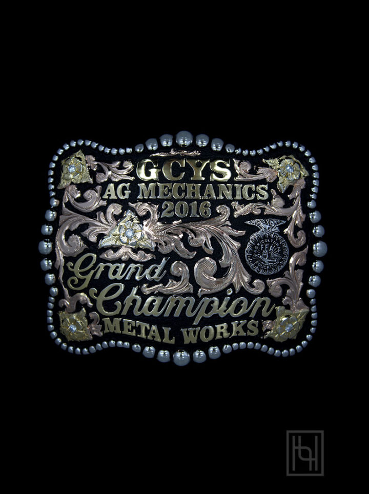 Black background w/ rose gold scrolls, yellow gold lettering and flowers, crystal clear cz stones, silver FFA diestrike, beaded edge