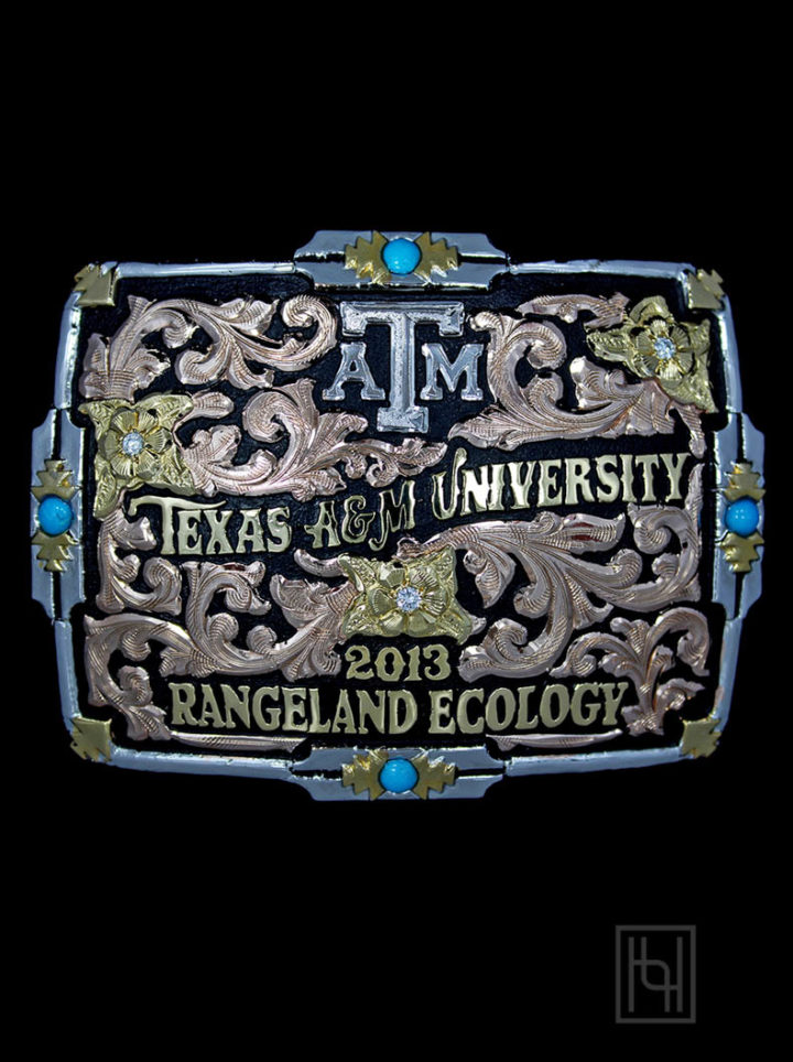 Black background w/ rose gold scrolls, yellow gold flowers and lettering, silver Texas A&M logo, four round blue turquoise genuine stones in edge