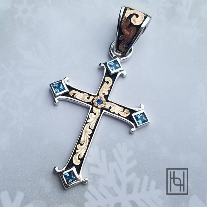 Cross w/ rose gold scrolls, black background, London Blue cz stones in edge and center.  Lay flat on snowflake paper
