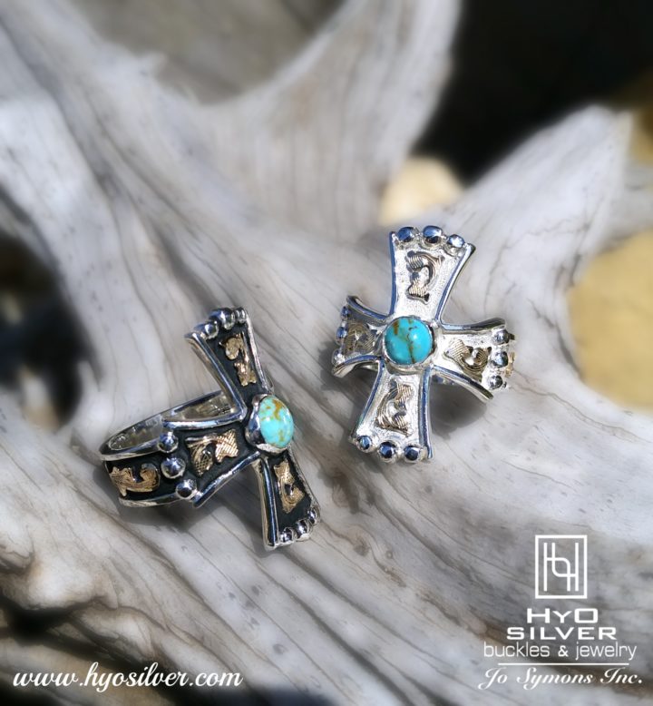 RRR012 Cross rings with blue turquoise stone in center, both w/ yellow gold scrolls.  One with black background, one with silver background