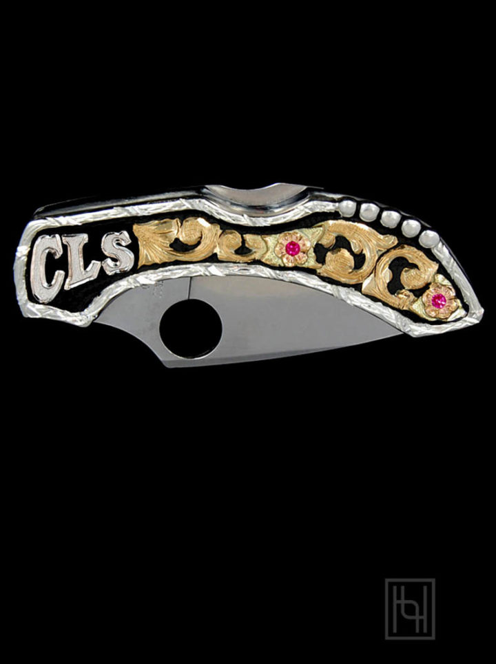 Black background w/ yeloow gold scrolls and flowers, ruby red cz stones, silver lettering - custom small knife