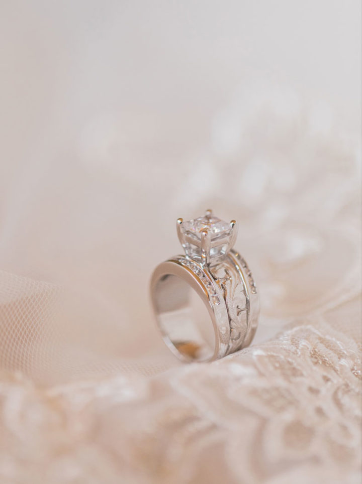 Silver Princess & Channel Set Ring on a Wedding Gown