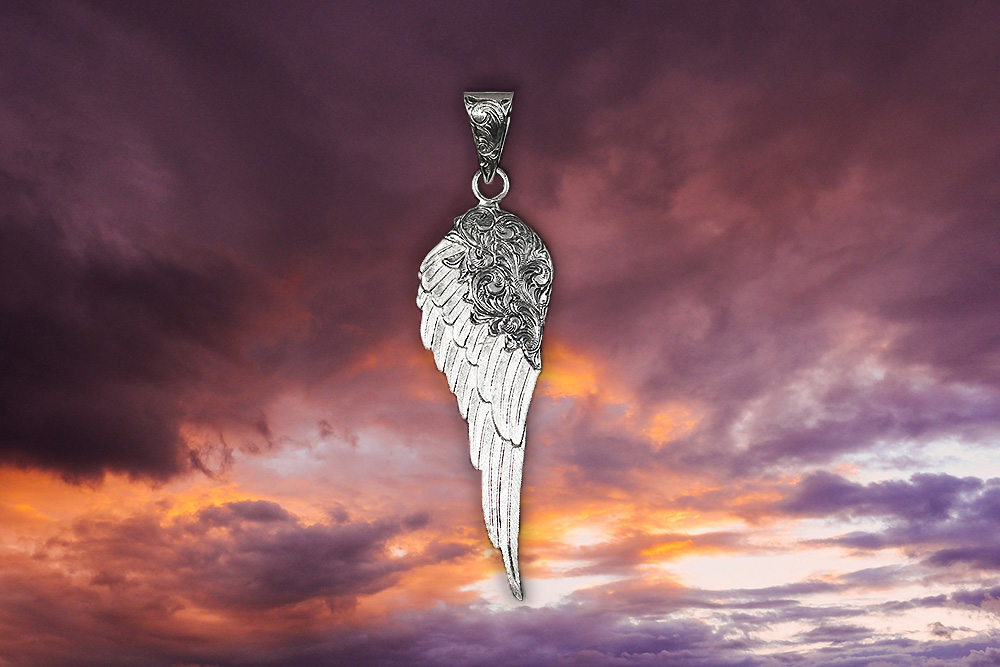 The Angel Wing Pendant Meaning & Symbolism