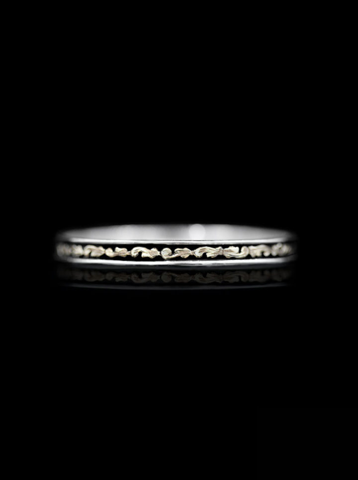 Silver and gold bangle bracelet w/ black antique