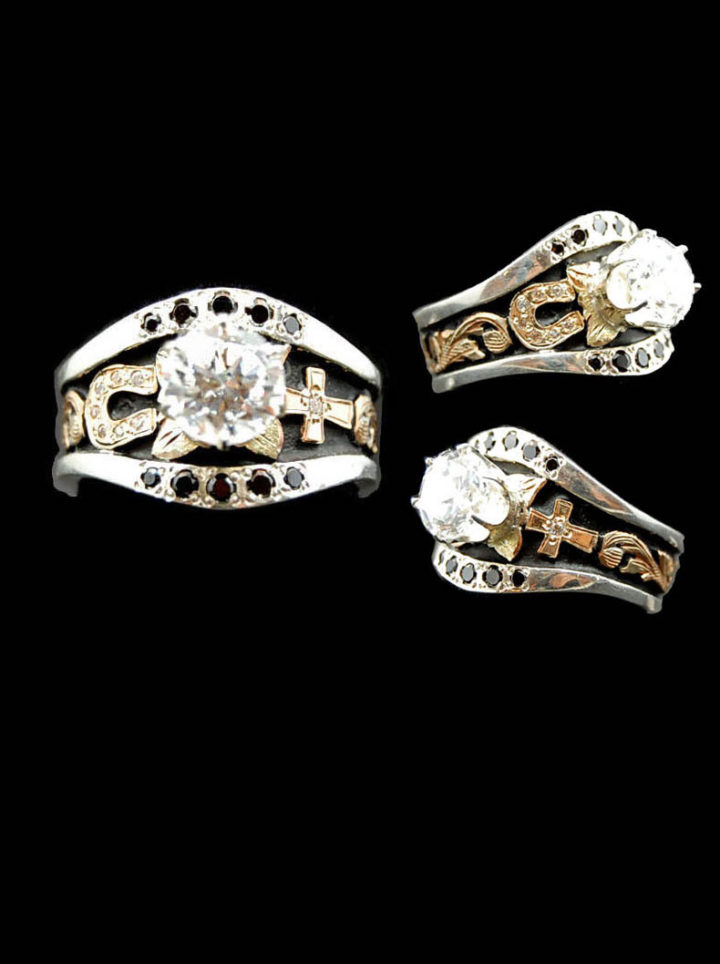 Custom ring w/ black background, yellow gold scrolls and horsehoe & cross, 8mm round crystal clear cz stone