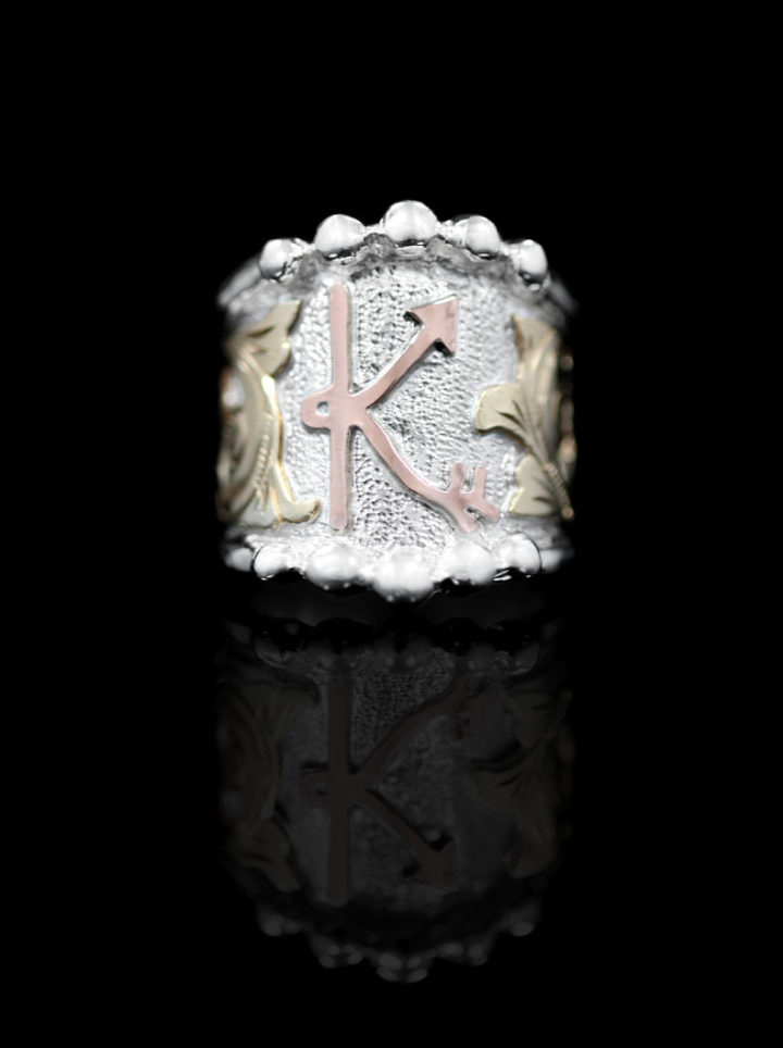 Custom ring - yellow gold scrolls w/ silver background, rose gold brand