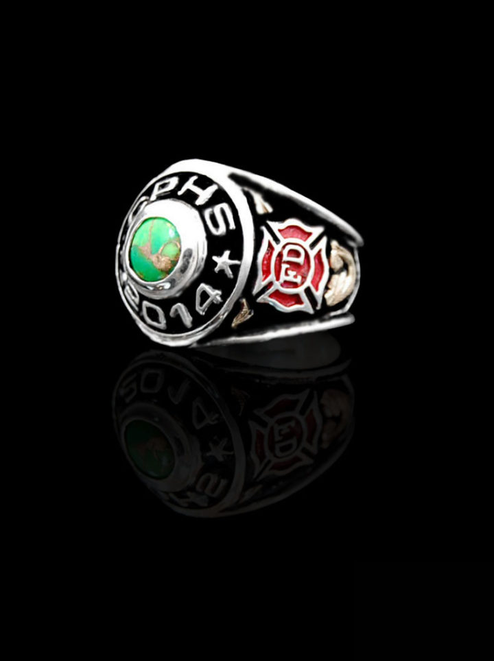 Custom ring w/ 1/2 round edge with black background and silver scrolls, fire department seal on side and green turquoise 8mm round stone
