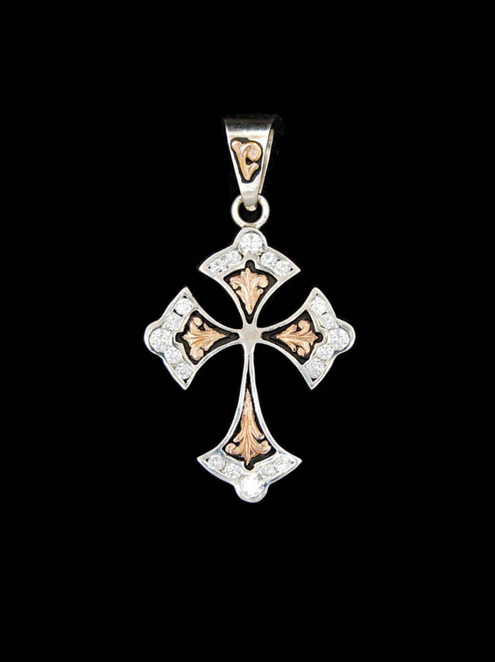 Flared cross with black background, yellow gold scrolls and 3 and 4mm crystal clear cz stones in edge