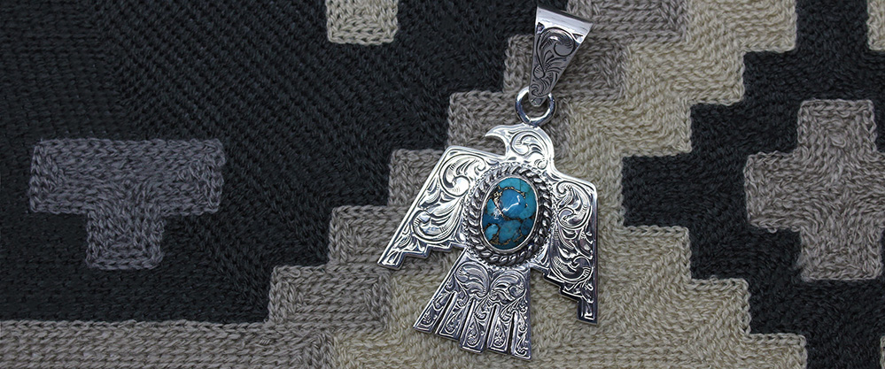 Engraved Silver Scroll Thunderbird with Blue Turquoise w/ Copper Matrix Stone Featured Header Photo