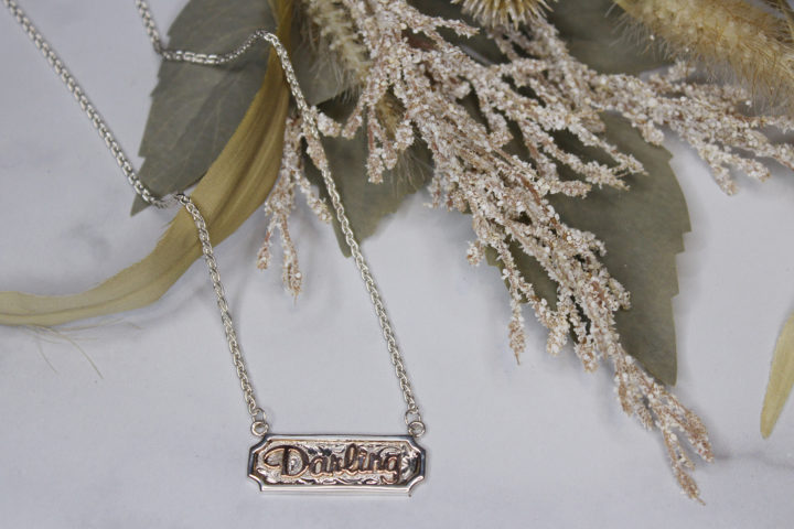 Bright Silver Engraved Scroll Name Necklace with Rose Gold Lettering