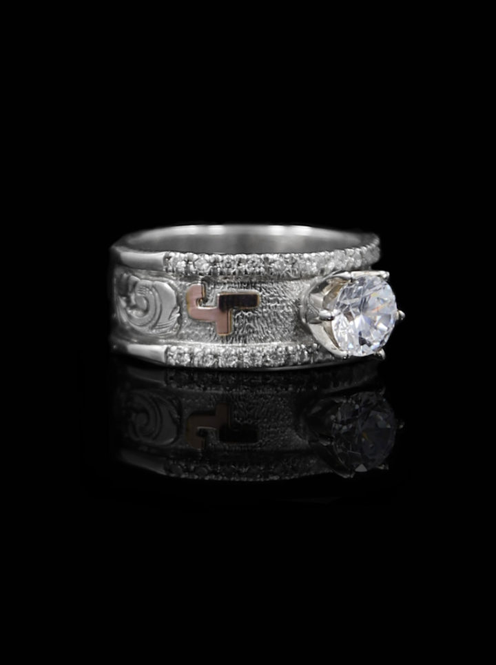 Side View, Silver Scrolls with Silver Background Ring and Rose Gold brand set with 7mm round Clear CZ
